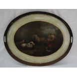 A 19th century Pontypool toleware japanned twin handled gallery tray of oval form painted to the
