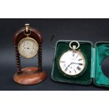 A gilt metal compensated pocket barometer, with a silvered dial,