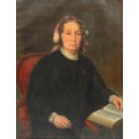 19th century British School Head and shoulders portrait of a lady seated reading Oil on canvas 89 x