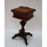 A Victorian rosewood teapoy, the hinged caddy top now enclosing a vacant lined interior,