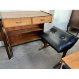 A mid 20th century teak bookcase / desk, with two drawers,