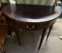 A 19th century style mahogany side table with a D shaped top and a single drawer on square tapering