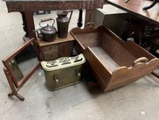 A pine rocking crib, together with a pine hanging cabinet, toilet mirror, copper kettle,