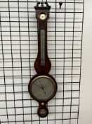 A 19th century mahogany banjo barometer with a broken swan neck pediment and mercury thermometer