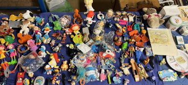 Children's annuals together with a large collection of children's toys etc