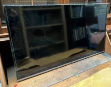 A Panasonic 40" LED television, Model number TX-40DS500B together witrh a wall mount, (sold as seen,