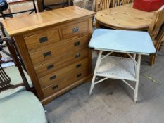 A modern pine chest with a rectangular top above two short and four long drawers on bracket feet