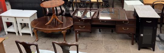 A pair of cream painted bedside cabinets together with two coffee tables,