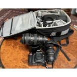 A Nikon D80 digital camera, together with a Nikon 80-400mm lens,