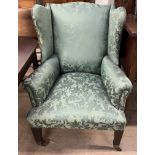 A 19th century mahogany wing back armchair,