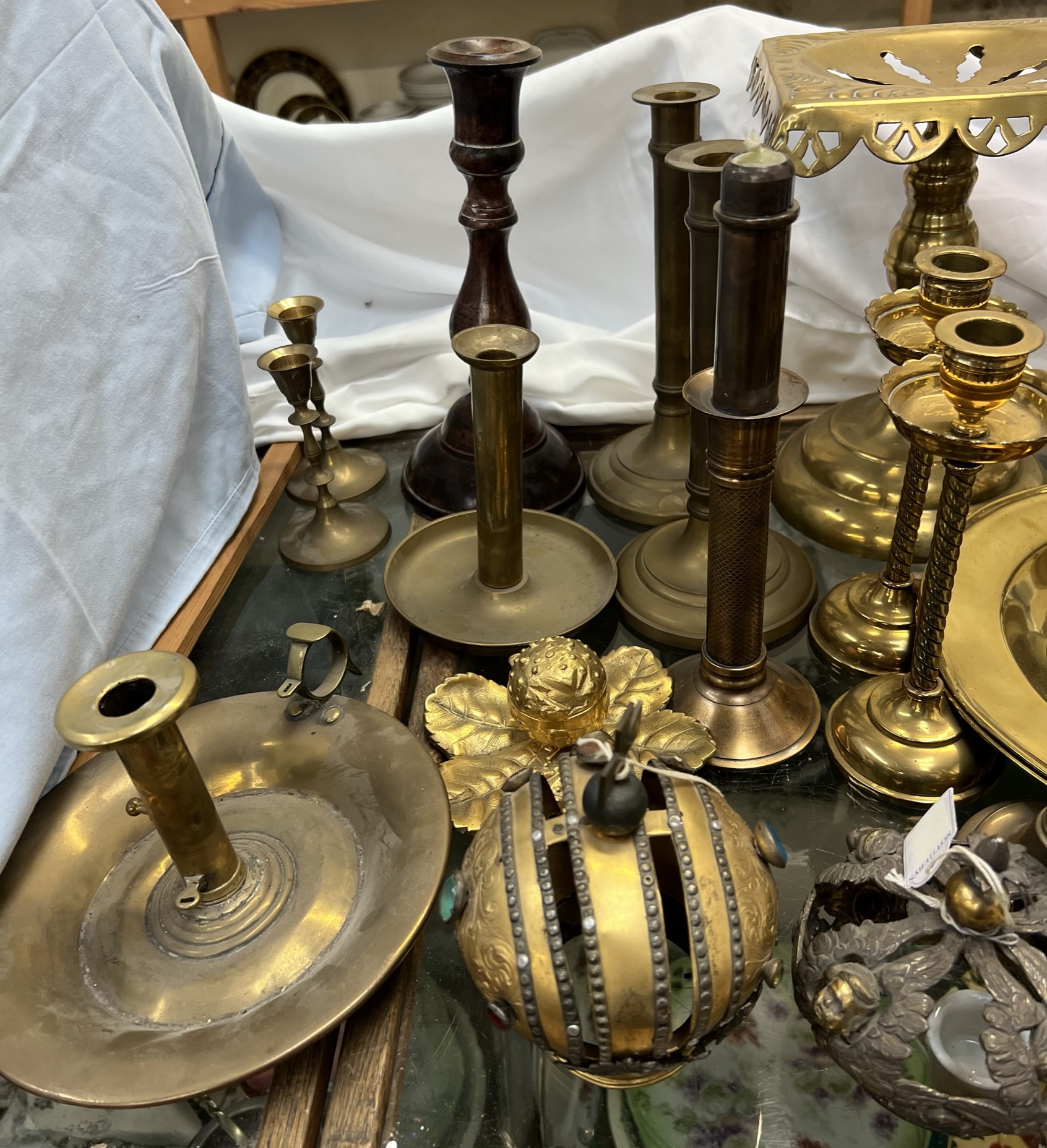 A gilt metal candelabra with flowerheads and leaves together with crowns, brass candlesticks, - Image 3 of 3