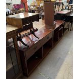 A 20th century mahogany side cabinet with a rectangular walnut feather banded inlaid top above a