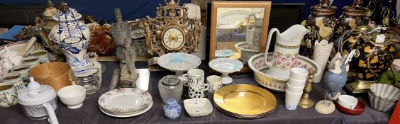 A large lot including table lamps, jug and basin set, mirror, gilt clock, assorted mugs,