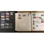 The Strand postage stamp album together with a stamp stock book