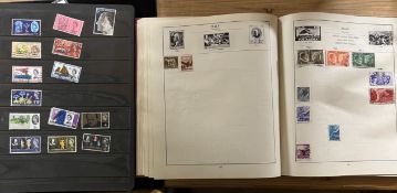 The Strand postage stamp album together with a stamp stock book