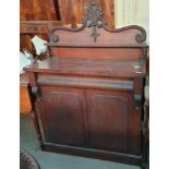 A Victorian mahogany chiffonier, with a raised shaped back,