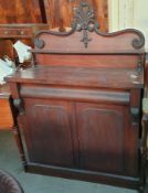A Victorian mahogany chiffonier, with a raised shaped back,