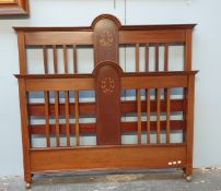 An Edwardian mahogany double bed