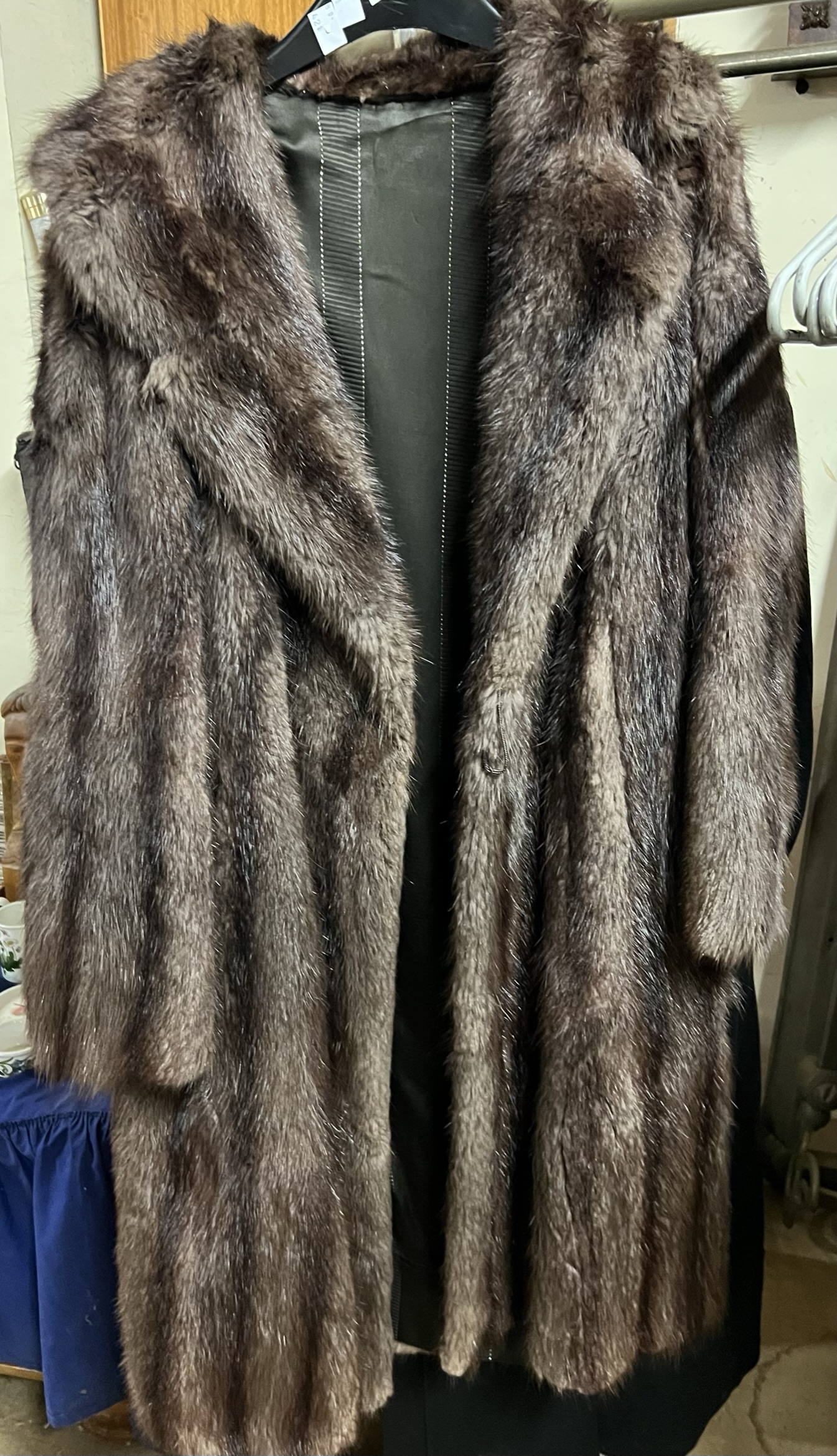 A three quarter length fur coat by Mar Barry