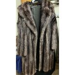 A three quarter length fur coat by Mar Barry