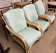 A set of three conservatory arm chairs