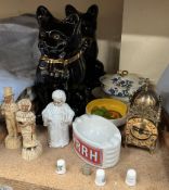 A pair of Staffordshire pottery cats together with pottery figures, brass clock,
