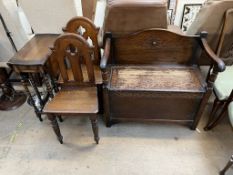 A 20th century oak bench together with a pair of oak hall chairs and an oak drop leaf table