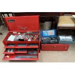 A Snap-on tool station with a hinged lid, and drawers together with a Snap-on tool box,