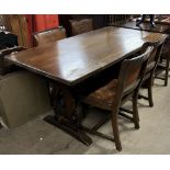 A 20th century oak refectory table together with a set of four oak dining chairs