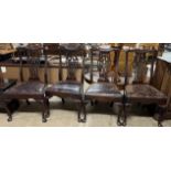 A set of four George III mahogany dining chairs,