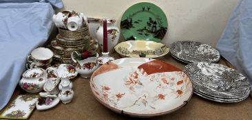 A Royal Albert Old Country Roses pattern part tea service together with a Satsuma pottery charger,