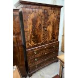 A 20th century mahogany bedroom suite, comprising two wardrobes,