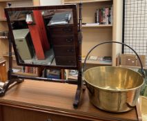 A Victorian mahogany toilet mirror together with a brass cooking pot