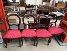 A set of four Victorian style balloon back dining chairs