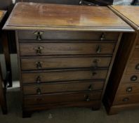 An Edwardian mahogany chest,