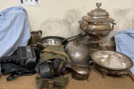 An electroplated samovar together with a meat dome, gas mask, copper pans,