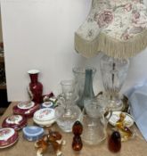 A cut glass table lamp together with other glasswares, Limoges porcelain boxes and covers,