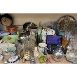 A large lot comprising glass decanters, drinking glasses, stoneware storage jar, brass door knobs,