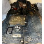 A Harley Davidson denim jacket, together with a Harley Davidson lighter,