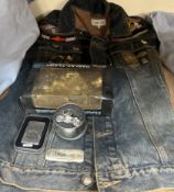 A Harley Davidson denim jacket, together with a Harley Davidson lighter,