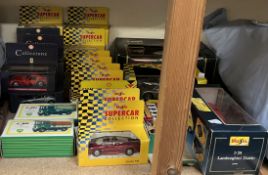 A collection of model cars including Corgi, Maisto,