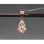 Gemporia - A 9ct rose gold Morganite and diamond pendant, set with round cut Morganite and diamonds,