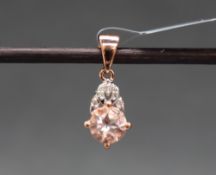 Gemporia - A 9ct rose gold Morganite and diamond pendant, set with round cut Morganite and diamonds,