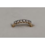 Gemporia - A 9ct gold Tomas Rae ring, set with round cut diamonds totalling 1/2ct,