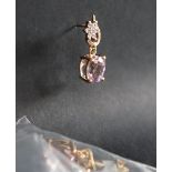 Gemporia - A pair of 9ct gold kunzite and white zircon earrings,