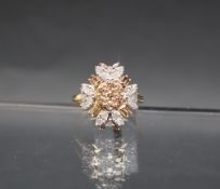 Gemporia - A 9ct gold diamond ring, set with round and tapered baguette cut diamonds,