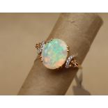 Gemporia - A 9ct gold opal, pink tourmaline and white zircon ring, to a 9ct gold setting and shank,