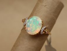 Gemporia - A 9ct gold opal, pink tourmaline and white zircon ring, to a 9ct gold setting and shank,