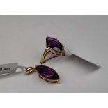 Gemporia - A 9ct gold amethyst ring, set with 5.