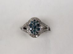 Gemporia - A 9ct white gold Tomas Rae blue and white diamond ring,